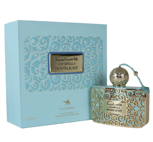 Casabella Moonlight perfume bottle and its matching light blue presentation box, featuring ornate gold filigree patterns and a gold label with Arabic and English text.