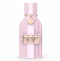 A pale pink ribbed perfume bottle labeled 'Countryside Junction Eau de Parfum' with a metallic gold-toned plaque and hanging tag, centered on a white background.