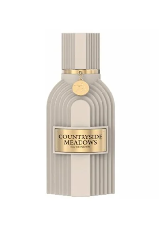 A ribbed, modern perfume bottle in a light beige/cream color with gold accents, including a gold label and a small gold medallion, on a plain white background.