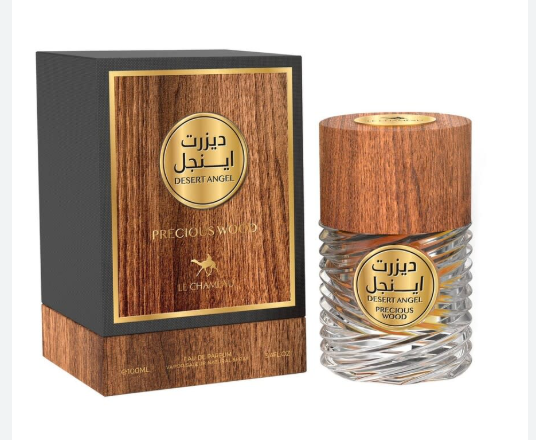 Le Chantier Precious World Decent Angel perfume bottle and its matching box. The bottle features a textured clear glass body with a wooden-patterned cap, and the box has a black side with a wood-grain front panel and gold accents.
