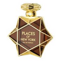 Places of New York Eau de Parfum bottle with a faceted gold geometric design and dark brown glass, on a white background.