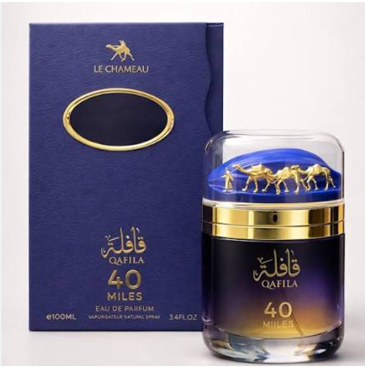 Le Chameau Qafila 40 Miles Eau de Parfum bottle next to its dark blue packaging box with gold accents.