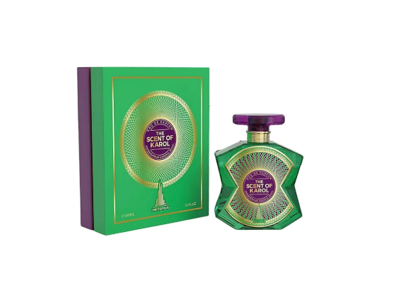 Scent of Karol perfume bottle and its green presentation box with gold circular detailing and a purple label, shown on a white background.