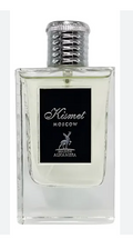A clear rectangular glass perfume bottle with pale yellow liquid, a black front label reading 'Kismet Moscow' with a deer logo, and a silver ribbed cap, shown on a white background.