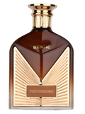 A bottle of Victorioso Heroic fragrance, featuring a dark amber brown glass body with a metallic gold V-shaped front design and a gold cap, set against a plain white background.