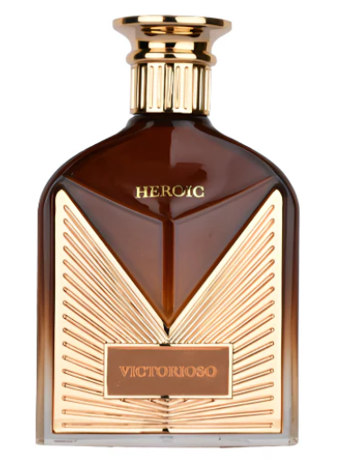 A bottle of Victorioso Heroic fragrance, featuring a dark amber brown glass body with a metallic gold V-shaped front design and a gold cap, set against a plain white background.