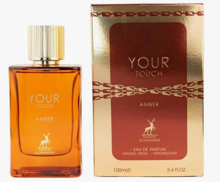 Maison Alhambra Your Touch Amber Perfume for Men and Women 3.4 oz EDP rectangular amber flacon displayed with gold metallic burgundy YOUR TOUCH AMBER Eau de Parfum Natural Spray box with gold chain-link border stripe and gold deer logo 100ml 3.4 FL OZ on white background amber bergamot freesia jasmine cattleya orchid centifolia rose amber patchouli UPC 6290362340973