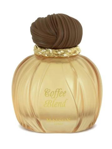 Maison London Coffee Blend perfume bottle with a ribbed gold glass body, a twisted dark brown cap, and a gold chain detail, on a white background.