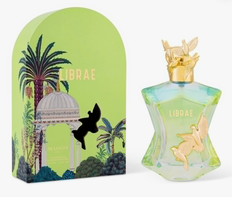 Maison Librae perfume bottle and matching illustrated box on a light gray background. The bottle is pale green with gold bird motifs and a gold cap, and the box features a tropical pavilion scene with palm trees and the text LIBRAE and MAISON.