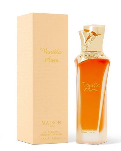 Maison Aura Vanilla Eau de Parfum bottle with amber-orange liquid and a gold cap, shown next to its beige packaging box with gold lettering.