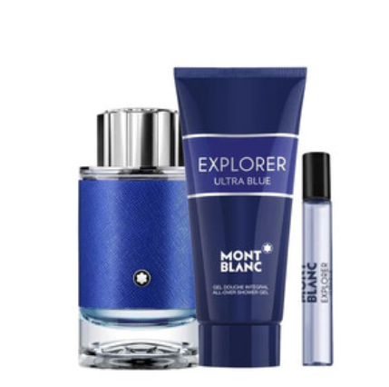 Montblanc Explorer Ultra Blue fragrance set featuring a blue textured bottle with a silver cap, a matching blue shower gel tube, and a small travel atomizer spray on a white background.
