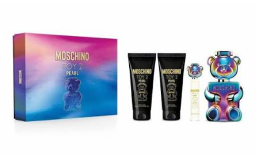 Moschino Toy 2 Pearl gift set featuring a colorful gradient box, two black body wash tubes, a small clear spray bottle, and a large iridescent teddy bear-shaped bottle on a white background.
