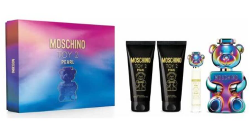 Moschino Toy 2 Pearl gift set featuring a colorful gradient box, two black body wash tubes, a small sample spray bottle, and a metallic iridescent teddy bear-shaped perfume bottle on a white background.