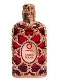 Orienta Amber Rouge perfume bottle with a red patterned glass body and ornate rose gold metal detailing, on a white background.