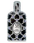 Orientica Oud Saffron perfume bottle with a silver filigree frame and blue gemstone accents on a black background.