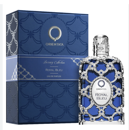 Orientica Royal Bleu Eau de Parfum bottle with an ornate silver filigree design next to its blue patterned packaging box.
