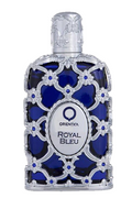 Oriental Royal Bleu perfume bottle with a silver filigree frame and deep blue glass background, featuring a silver cap and a central oval label.