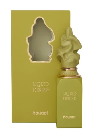 A bottle of nayapt Liquid Desire perfume next to its matching olive green box, featuring a sculpted cap and gold neck detailing.