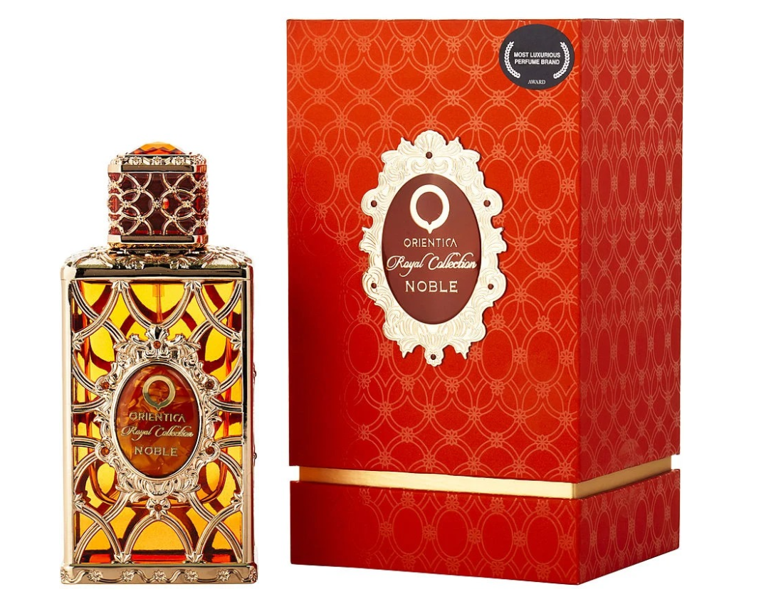 Orienta Royal Collection Noble perfume bottle next to its red patterned packaging box, featuring gold and red detailing.