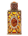 Orientika Royal Collection Noble perfume bottle with an ornate gold and red filigree design, featuring a central oval label and a matching cap, set against a plain white background.
