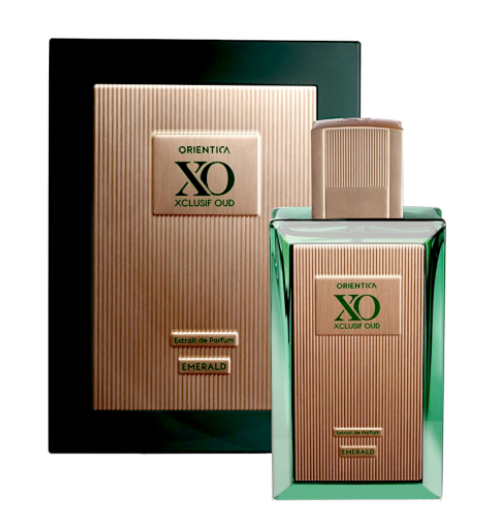 Orientalia XO Extrait de Parfum in Emerald, showing the green glass perfume bottle with a ribbed rose-gold cap next to its matching green and rose-gold outer box.