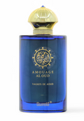 Amouage Al Oud Vagues De Aoud perfume bottle by Sumati, featuring a translucent cobalt blue glass bottle with a metallic gold cap and gold lettering.